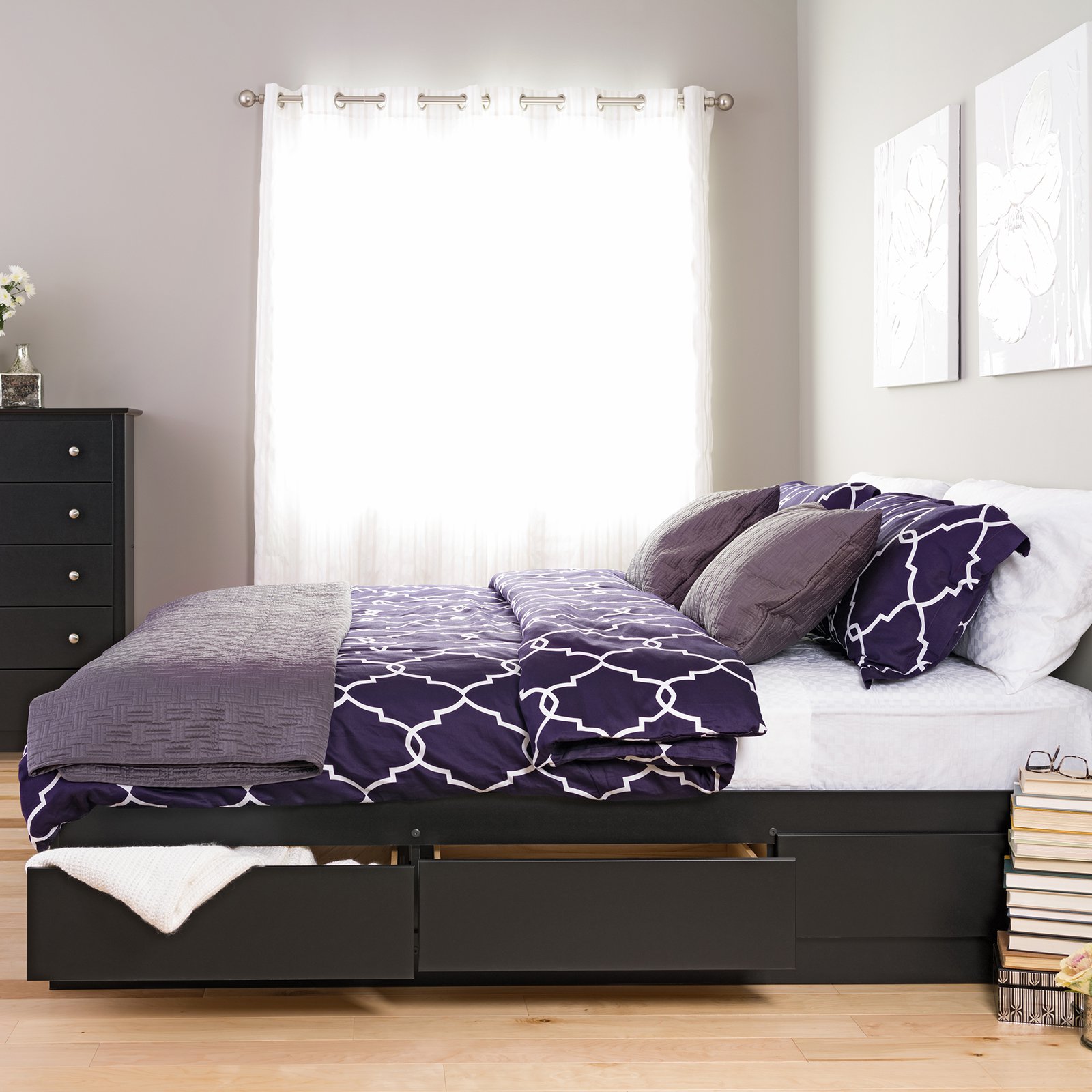 Brown Wooden Platform Bed With Blue Floral Bed Mat